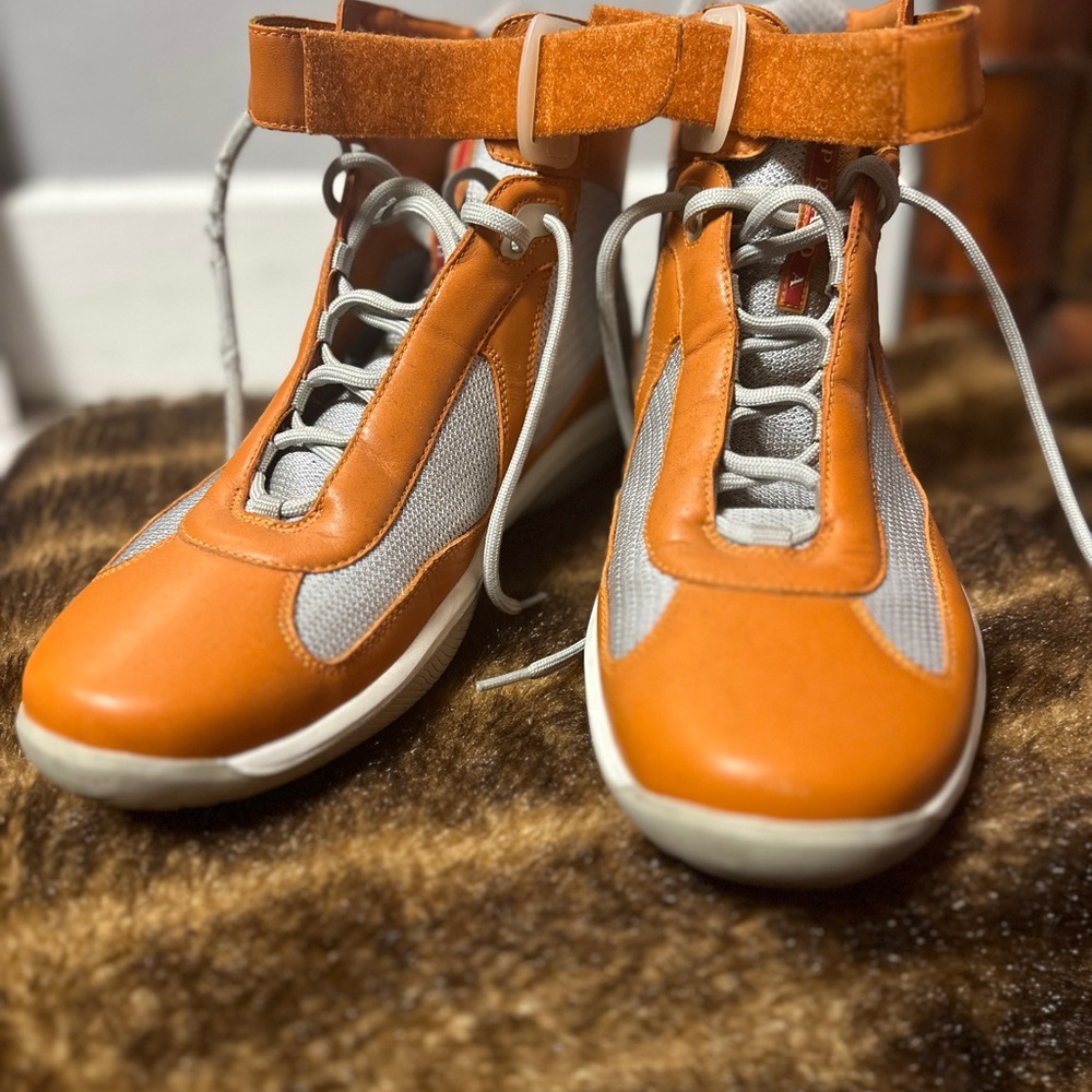 Prada Americas Cup High Top Sneakers.